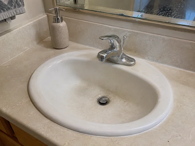 Bathroom vanity before cleaning